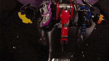a close up of a person 's torso with a red item on it that says ' a ' on it