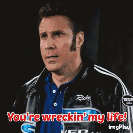 a man in a blue shirt and a black jacket says you 're wrecking my life