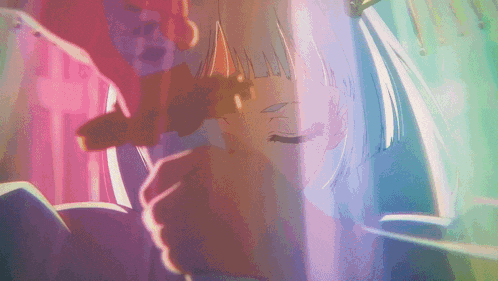a close up of a person 's face with a rainbow of colors