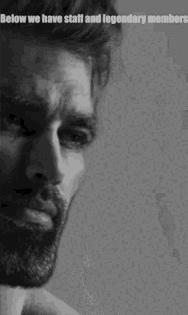 a black and white photo of a man with a beard that says below we have staff and legendary members .