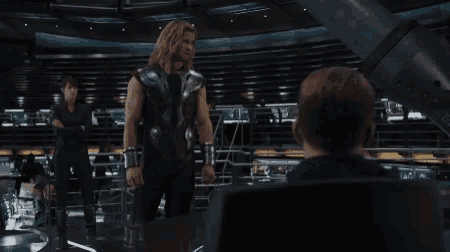a scene from a movie where thor is talking to a man