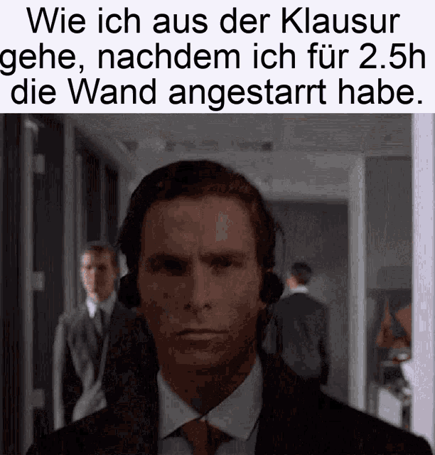 a man in a suit and tie is wearing headphones and a caption that says wie ich aus der klausur gehe