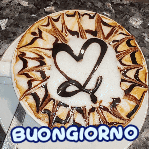 a cup of cappuccino with a heart drawn on it