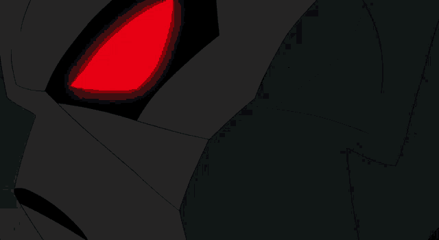 a close up of a robot 's red eyes