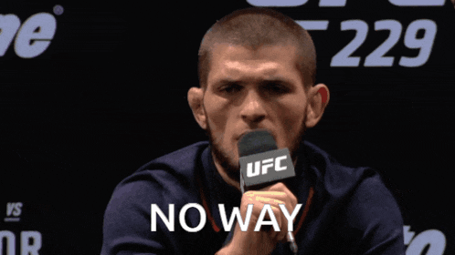 a man speaking into a microphone that says ufc no way