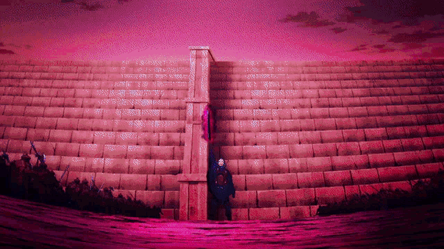 a man stands in front of a large brick wall with a purple background