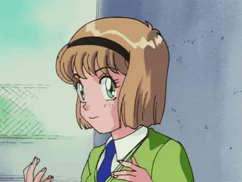 a girl with blonde hair and green eyes is wearing a green jacket and tie