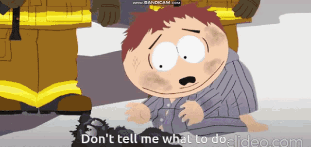a cartoon character says " do n't tell me what to do " in front of a fireman