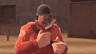 a soldier in an orange uniform is holding a gun in his hand
