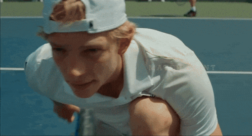 a man on a tennis court with the words match point written on the bottom