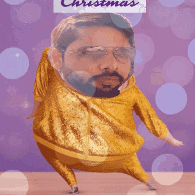 a man with glasses and a beard is on a purple background with a sign that says christmas