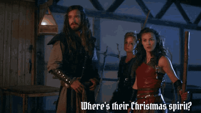 a man and two women standing next to each other with the words " where 's their christmas spirit " above them