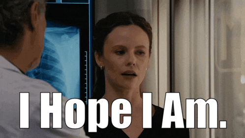 a woman says i hope i am while looking at a man