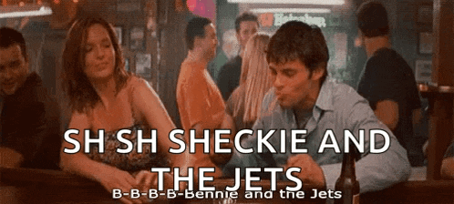 a man and a woman are sitting at a bar with the words sh sh sheckie and the jets above them