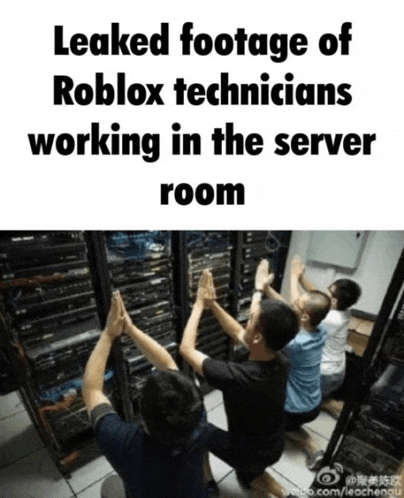 a group of men giving each other a high five in front of a server room
