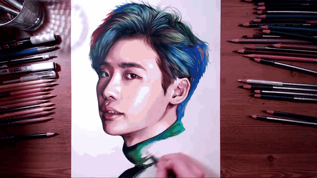 a drawing of a man with blue hair is on a wooden table