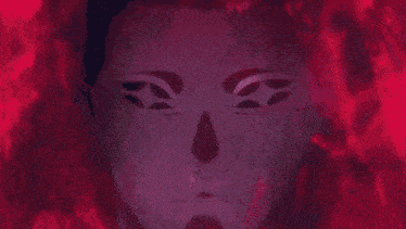 a close up of a person 's face with a purple background