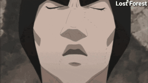 a close up of a man 's face with the words lost forest below