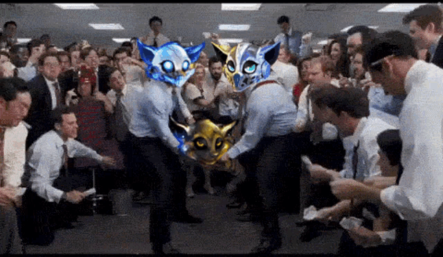 a group of people in suits and ties are dancing with a cat on their head