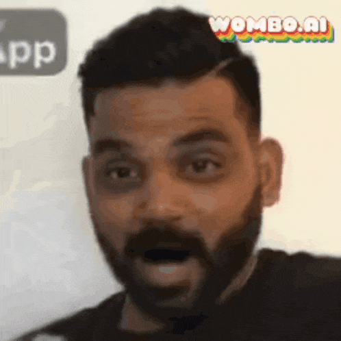 a man with a beard and a surprised look on his face