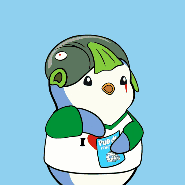 a penguin is wearing a shirt that says i love pingos