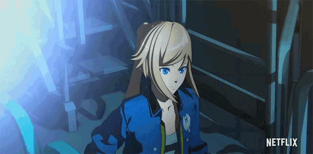 a girl in a blue jacket with netflix written on the bottom right