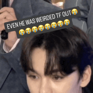 a man 's head with a sticker that says " even he was weirded tf out "