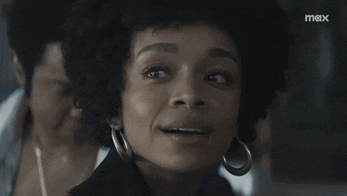 a close up of a woman 's face with the word max on the bottom right
