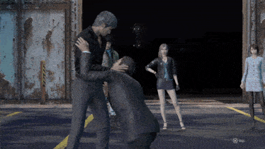 a screenshot of a video game shows a man hugging another man in front of a sign that says " caution "
