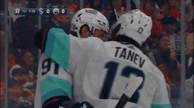 a hockey player with the name tanev on his back