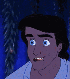 a close up of a cartoon character 's face with a surprised look on his face