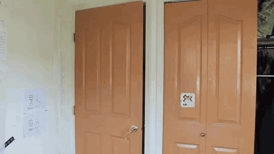 a door with a sticker on it that says ' i 'm sorry '