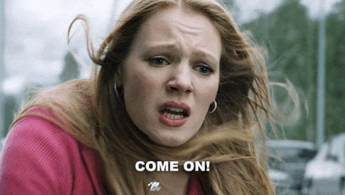 a woman in a pink sweater is making a funny face and the words come on are above her