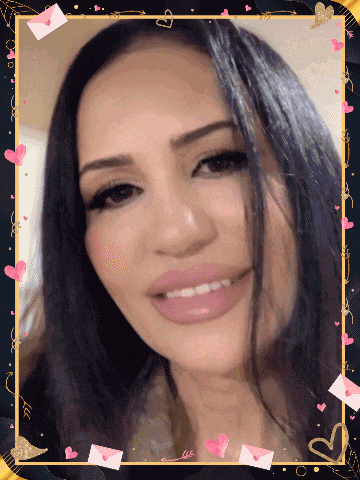 a woman 's face is framed with hearts and arrows
