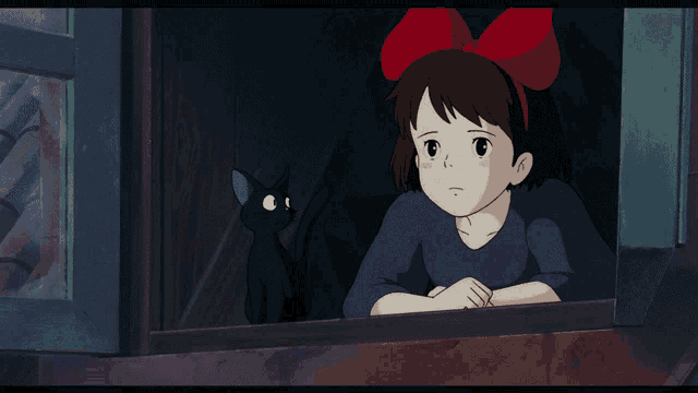 a girl with a red bow on her head is looking out of a window with a black cat behind her