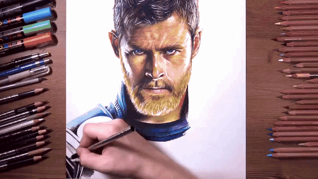 a person is drawing a picture of thor with colored pencils in the background
