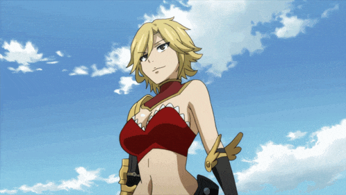 a woman in a red top is standing in front of a blue sky with clouds