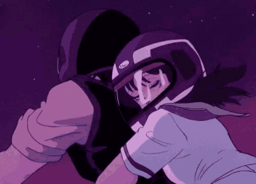 a man and a woman are riding a motorcycle in the night sky .
