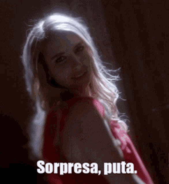 a woman in a red dress with the words sorpresa puta
