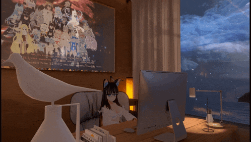 a computer monitor sits on a desk in front of a large painting that says tf1