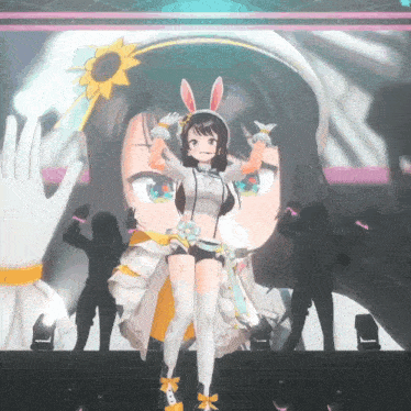 a girl with bunny ears and a sunflower on her head is dancing on a stage