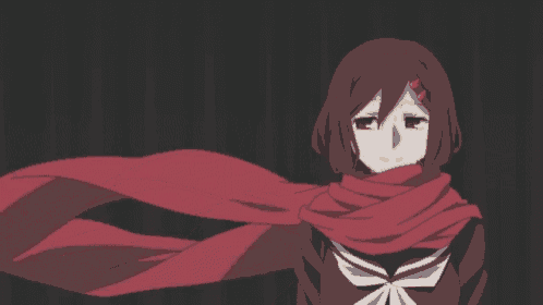 a girl with a red scarf around her neck is wearing a school uniform