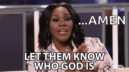 a woman is sitting on a couch with her hands in her pockets and says `` amen let them know who god is '' .