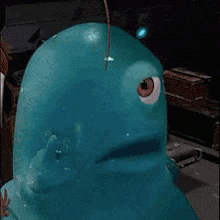 a pixelated image of a blue monster with one eye and a tear coming out of it 's eye .