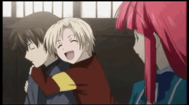 a girl with red hair looks at a boy with blonde hair