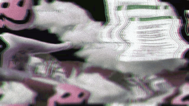 a pink and white smiley face is surrounded by a blurred image