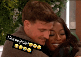 a man and a woman hugging with a sticker that says first we jiboled on it