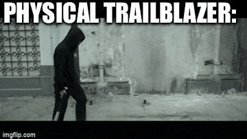 a man in a hooded jacket is walking down a sidewalk with the words physical trailblazer written above him