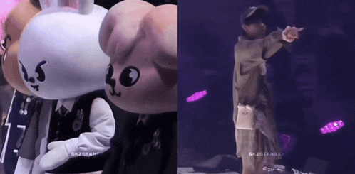 a man is standing next to a stuffed animal with the number 40 on it ..