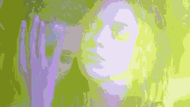 a man and a woman are standing next to each other in a purple light .